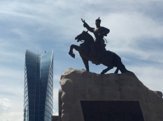 equestrian statue of Damdin Sükhbaatar and Blue Sky Hotel